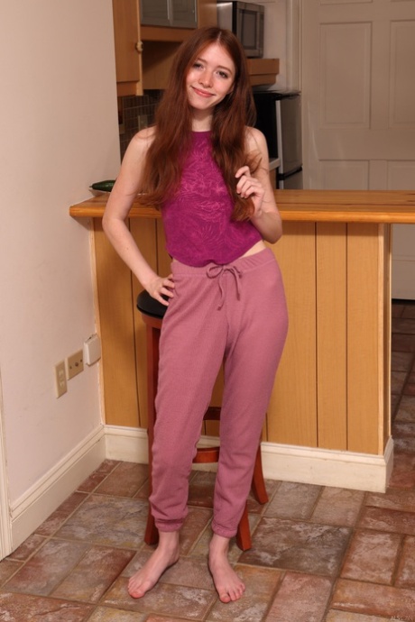 Authentic young adult Myra Glasford shows her slim figure and plays with her twat