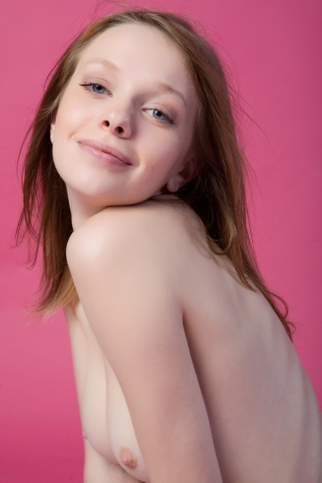 Pretty eyed young adult Kylie A teases with her slim figure in pink stockings