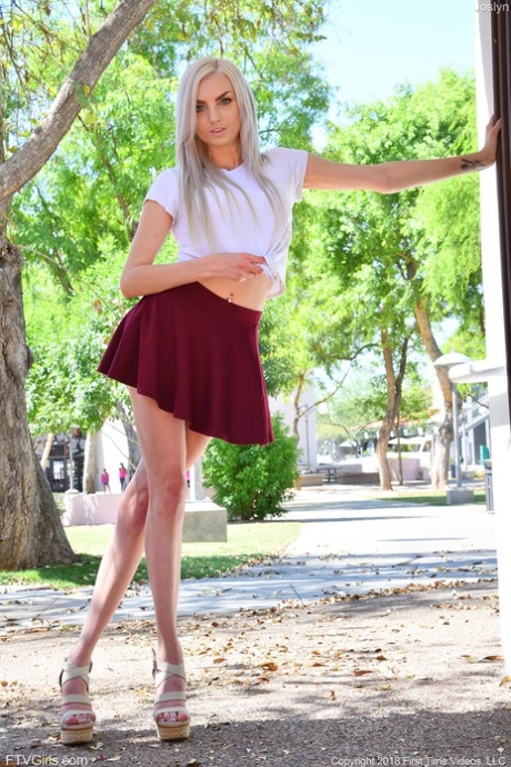 Platinum blonde Joslyn strips to her lingerie & flashes her femininity in public