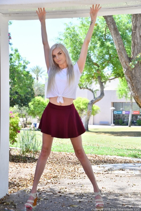 Platinum blonde Joslyn strips to her lingerie & flashes her femininity in public