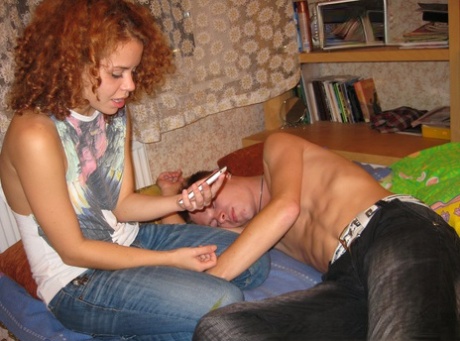 Curly haired young adult gets boned and jizzed in front of her handcuffed cuckold