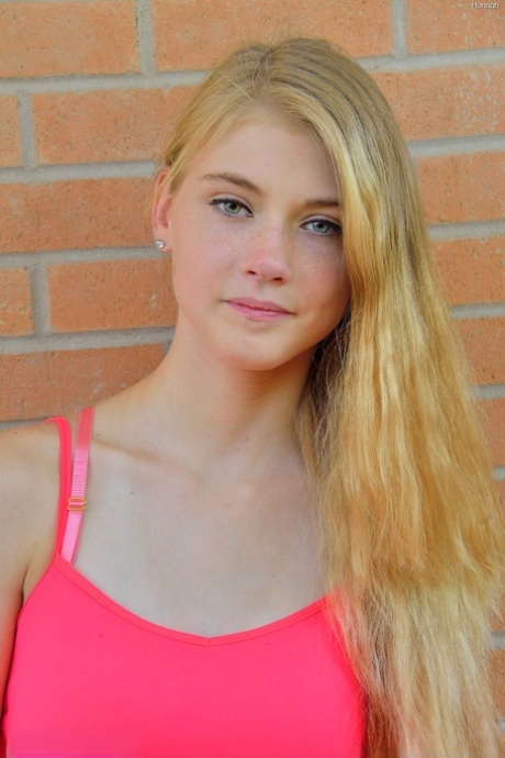 Slim blonde young adult Hannah exposes her shaved cunt and curves in public