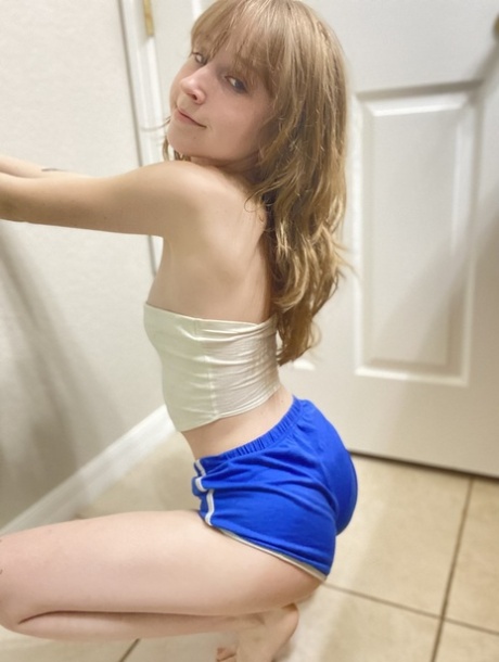 Authentic vixen Teensy Bella teasing with her firm booty in a solo