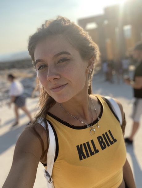 Skinny babe takes artistic selfies showing her tiny breasts and her tight curves