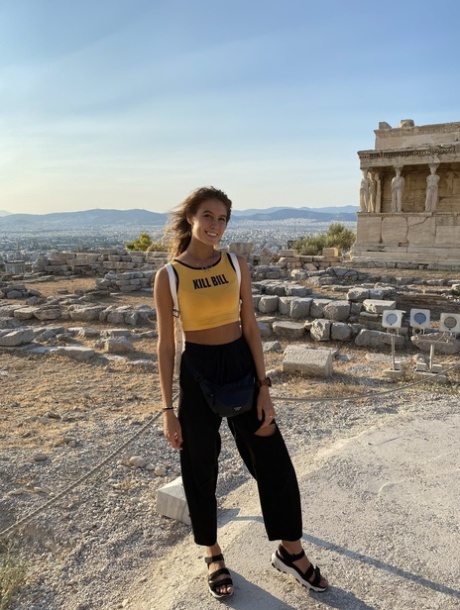 Skinny babe takes artistic selfies showing her tiny breasts and her tight curves