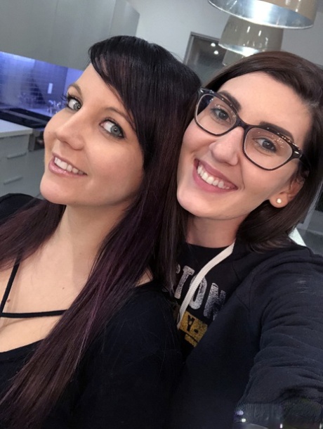 Slim young adult Andi Land takes candid artistic and clothed selfies while at home