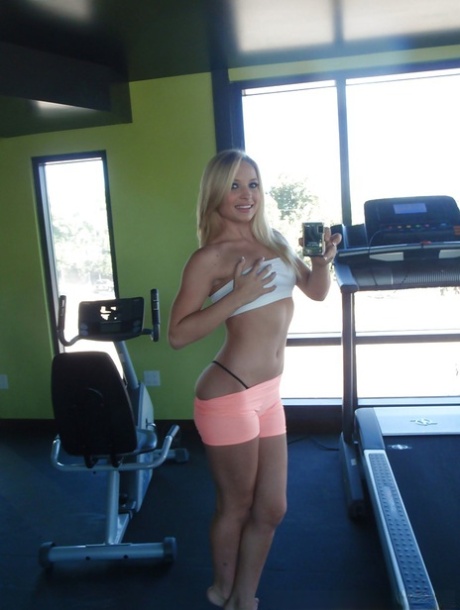 Attractive blonde teenager Alyssa taking alluring non artistic self shots at home