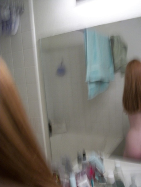 Ginger authentic Emily takes selfies of her natural young adult body in the mirror