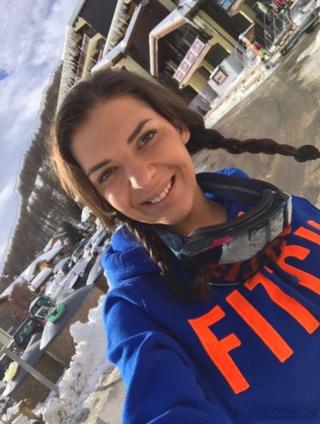 Russian young adult Alina Henessy takes artistic and non artistic selfies during the day