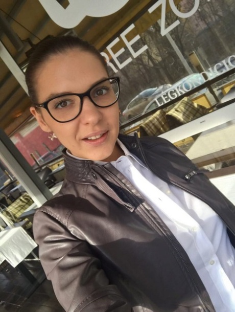 Russian young adult Alina Henessy takes artistic and non artistic selfies during the day