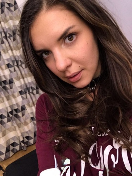 Russian young adult Alina Henessy takes artistic and non artistic selfies during the day