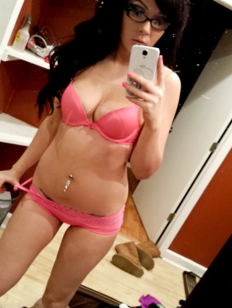 Authentic chick with long black hair Sabrina Sins takes artistic selfies