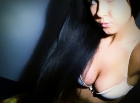 Authentic chick with long black hair Sabrina Sins takes artistic selfies