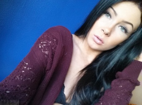 Authentic chick with long black hair Sabrina Sins takes artistic selfies
