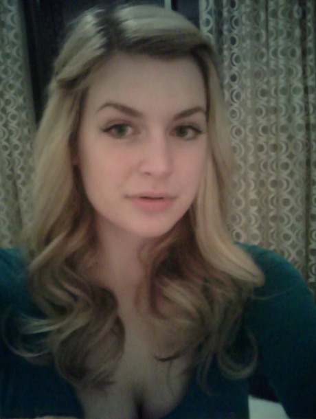 Blonde girl takes non artistic selfies in various places around her house