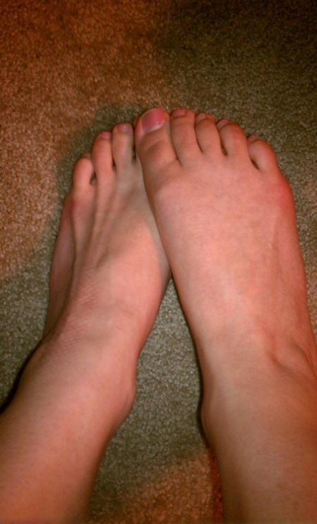 Blonde girl takes non artistic selfies in various places around her house