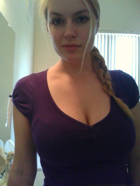 Blonde girl takes non artistic selfies in various places around her house