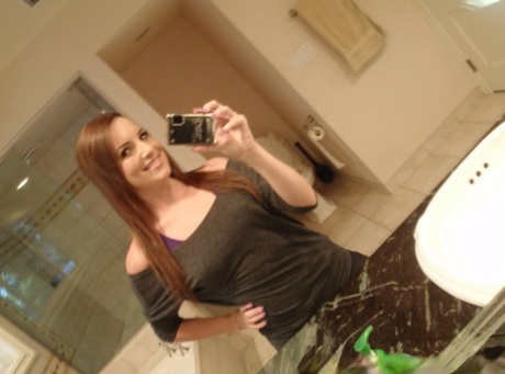 Sweet authentic chick takes artistic self shots of her young young adult breasts