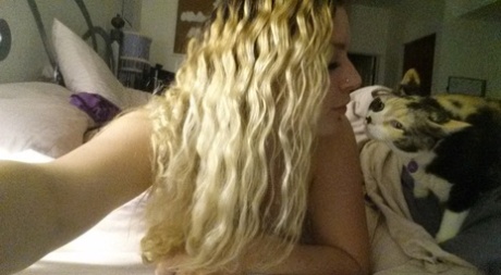 Big titted authentic takes artistic and semi-nude selfies around her house