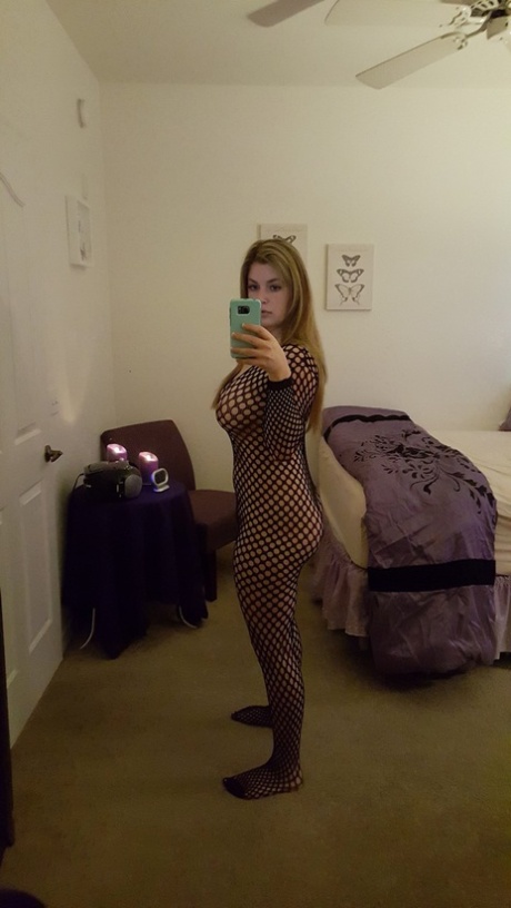 Big titted authentic takes artistic and semi-nude selfies around her house