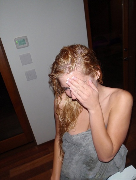 Young blonde girl takes artistic and semi-nude selfies during solo action