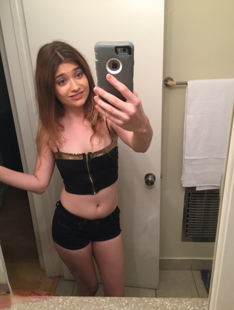 Petite young adult Ariel Mc Gwire makes her artistic modeling debut in bathroom selfies