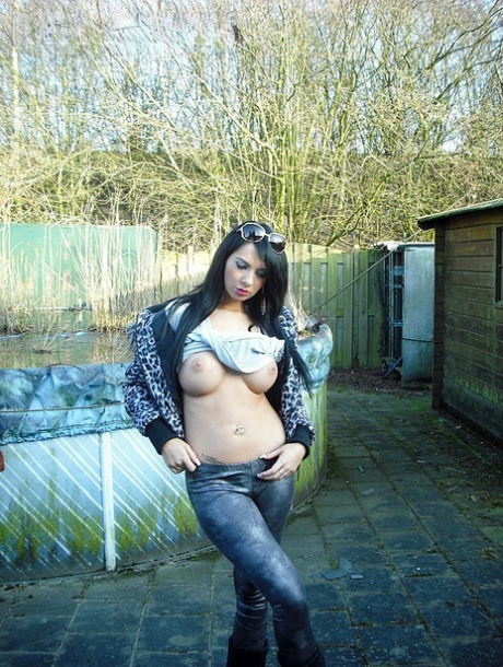 Dark haired authentic goes natural in a car before giving a oral pleasure in public