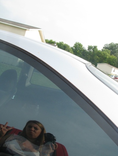 Dirty authentic young adult Nikki Morgan flaunts her cleavage in intimacy self shot photos