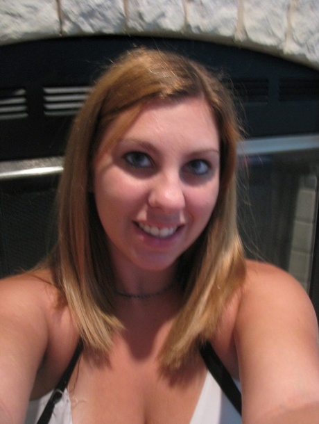 Dirty authentic young adult Nikki Morgan flaunts her cleavage in intimacy self shot photos