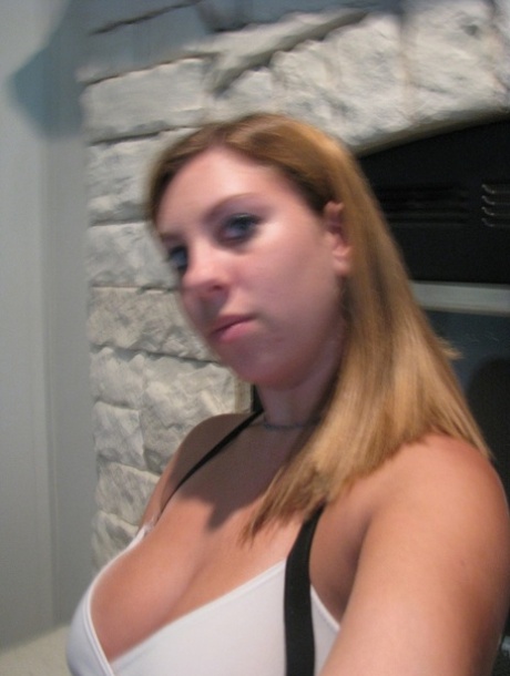 Dirty authentic young adult Nikki Morgan flaunts her cleavage in intimacy self shot photos