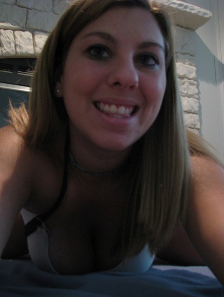 Dirty authentic young adult Nikki Morgan flaunts her cleavage in intimacy self shot photos