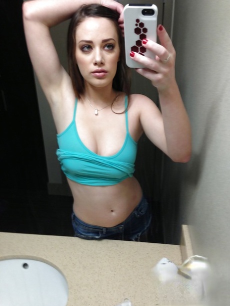 Attractive authentic pictures herself as she strips down and teases her femininity