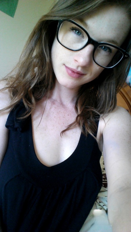 Solo girl Gemma Minx takes selfies in various states of undress