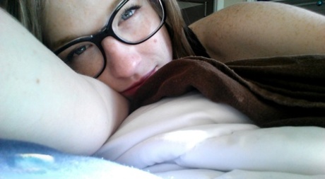 Solo girl Gemma Minx takes selfies in various states of undress