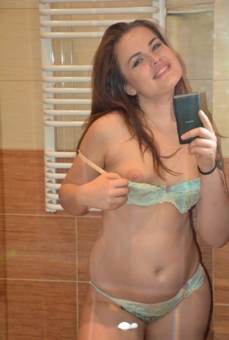 Incredibly sexy amateur teen posing in her lingerie and naked in a solo