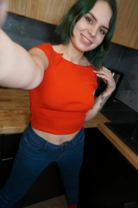 Sexy cheerleader takes nude selfies showing her small tits & her hot ass