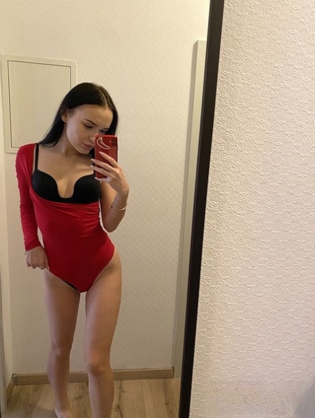 Dark-haired amateur Sasha Sparrow takes selfies of her big booty as she strips