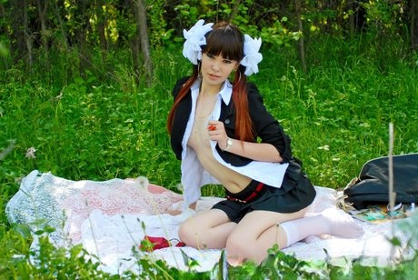 18-year-old schoolgirl peels on a blanket outdoors & shows her big ass & holes