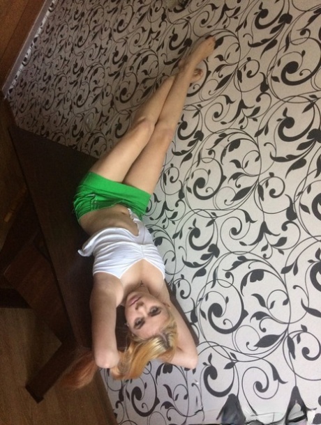 slender blonde amateur unveils her big ass and small tits on a table