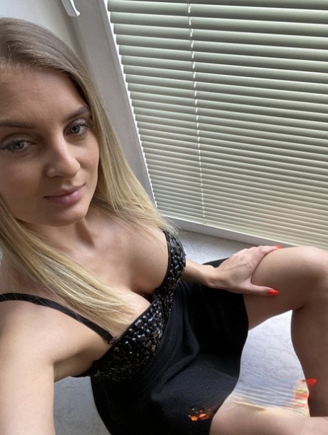 Blonde pornstar with firm tits Imanuela flaunts her incredible figure