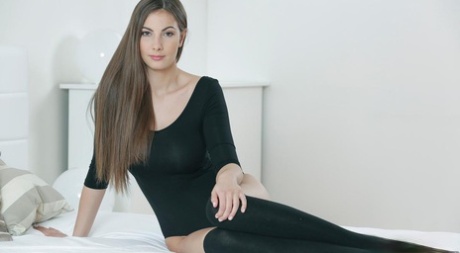 Long legged Connie Carter in socks, baring big breasts & bald twat close up