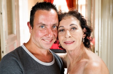 Horny granny Pixie strips to ride cowgirl & sucks younger cock for cum facial