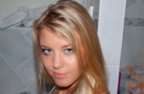 Barely legal blonde Barbara D uncups her perky boobs in yoga pants