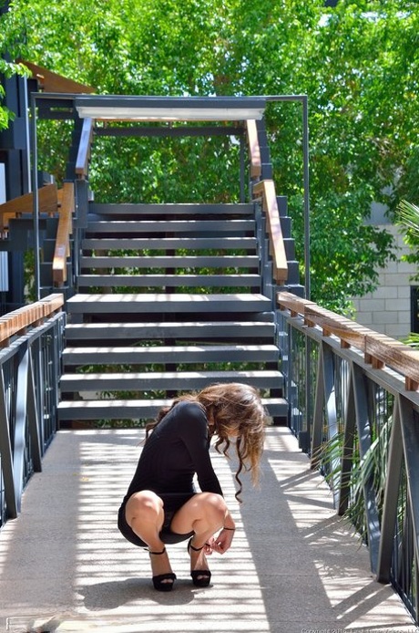 Slender authentic Adria strips and plays with cucumber and big rubber dildo