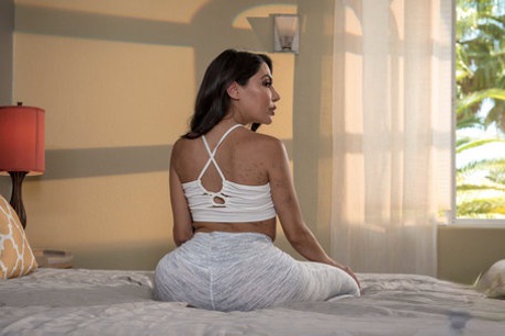 Busty Latina bimbo Lela Star strips attractive leggings and shows her monster booty