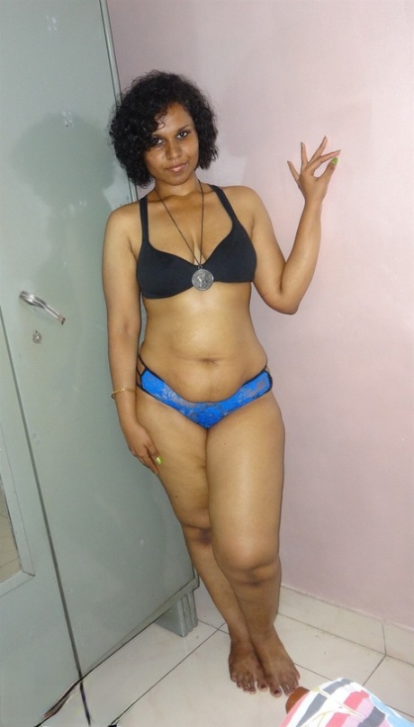 Chubby Desi solo girl releases her breasts from bra before flashing some curves
