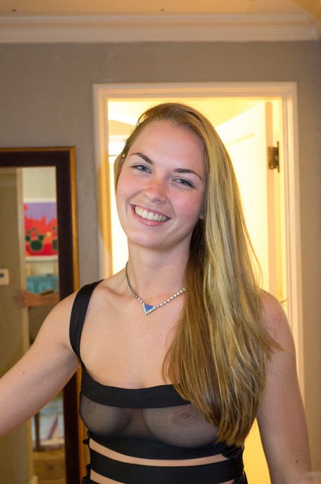 Young adult cutie Bailey Rayne shows her attractive curves while teasing in her attractive lingerie