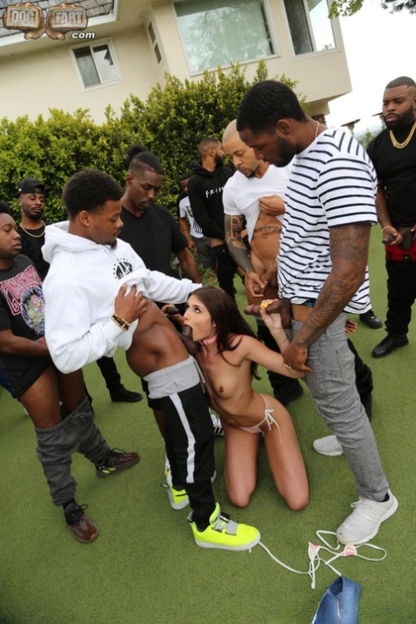 Skinny nympho Adria Rae shows her titties and enjoys an interracial blowbang