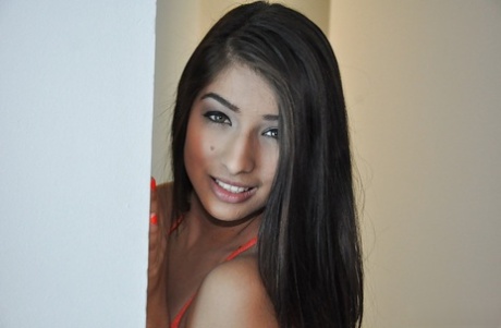 Amazingly alluring latina posing in sheer lingerie and flashing her gash