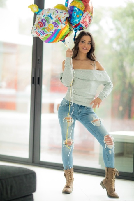 Brunette American babe Gia Paige strips and exposes her alluring white panties